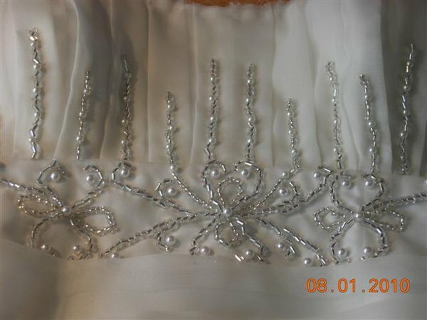 Brautkleid für meine Tochter
Perlenstickerei