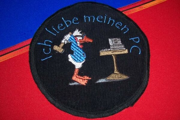Sticherei auf dem Notebookschutz