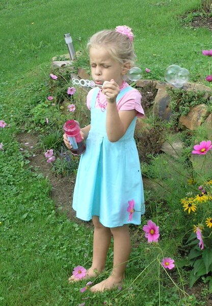 Trägerkleid mit Kellerfalten